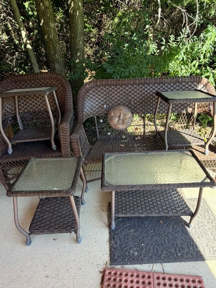 Wicker patio set with glass tables