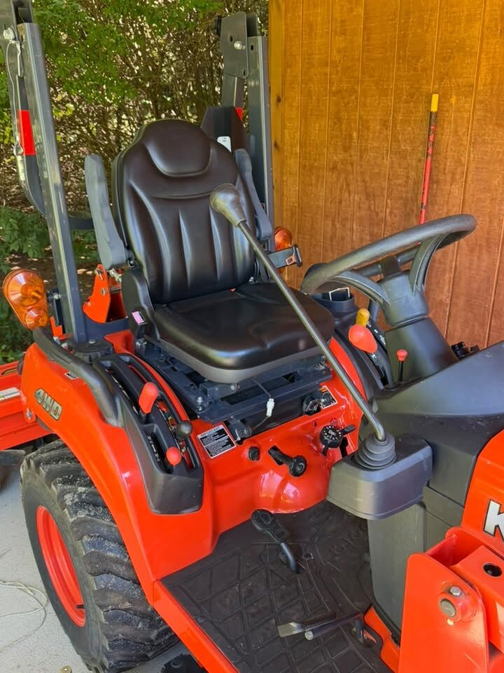 Tractor operator seat and controls